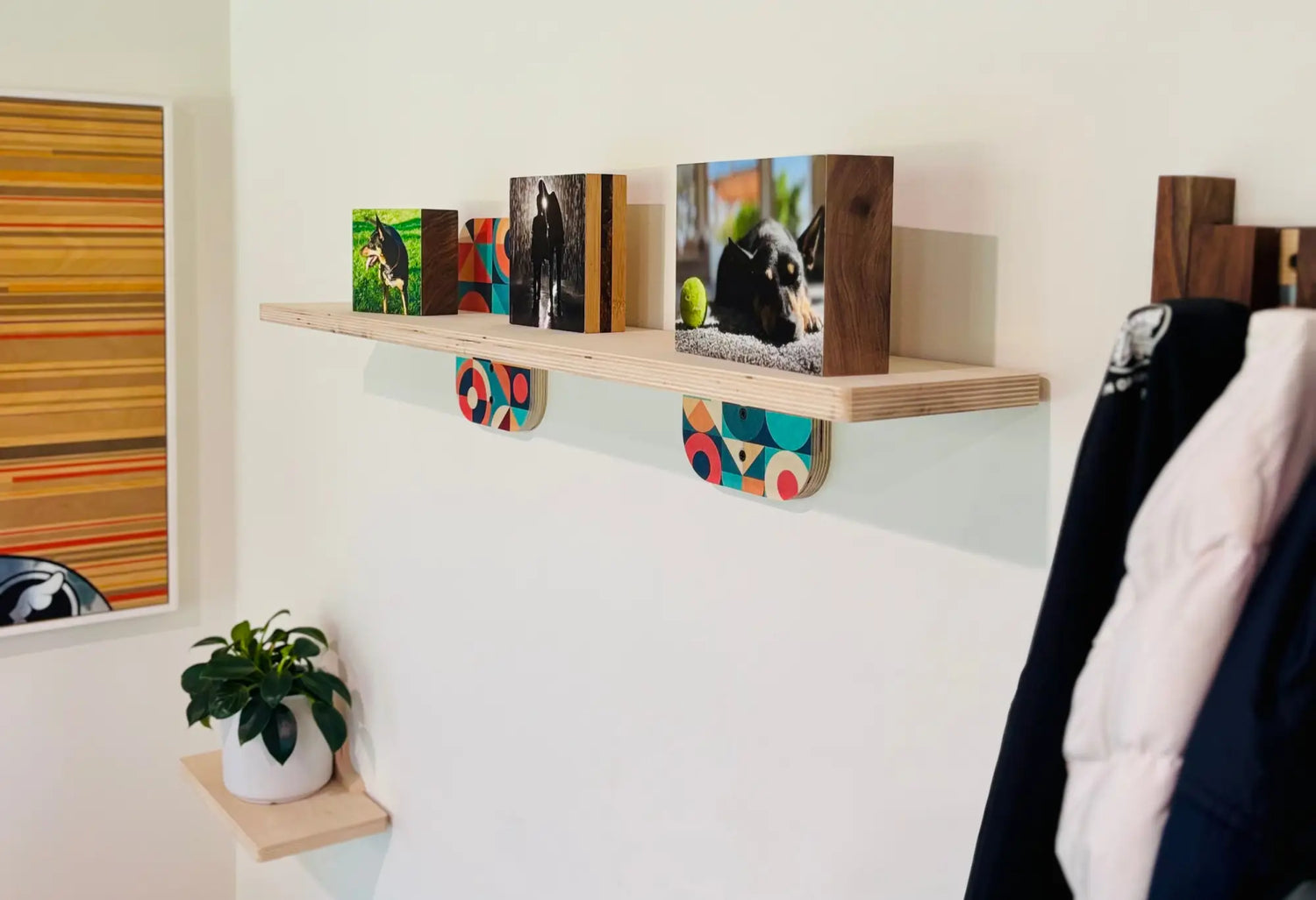 Wooden wall shelf with decorative patterned brackets from Woodsnap’s simple sturdy wall shelf collection