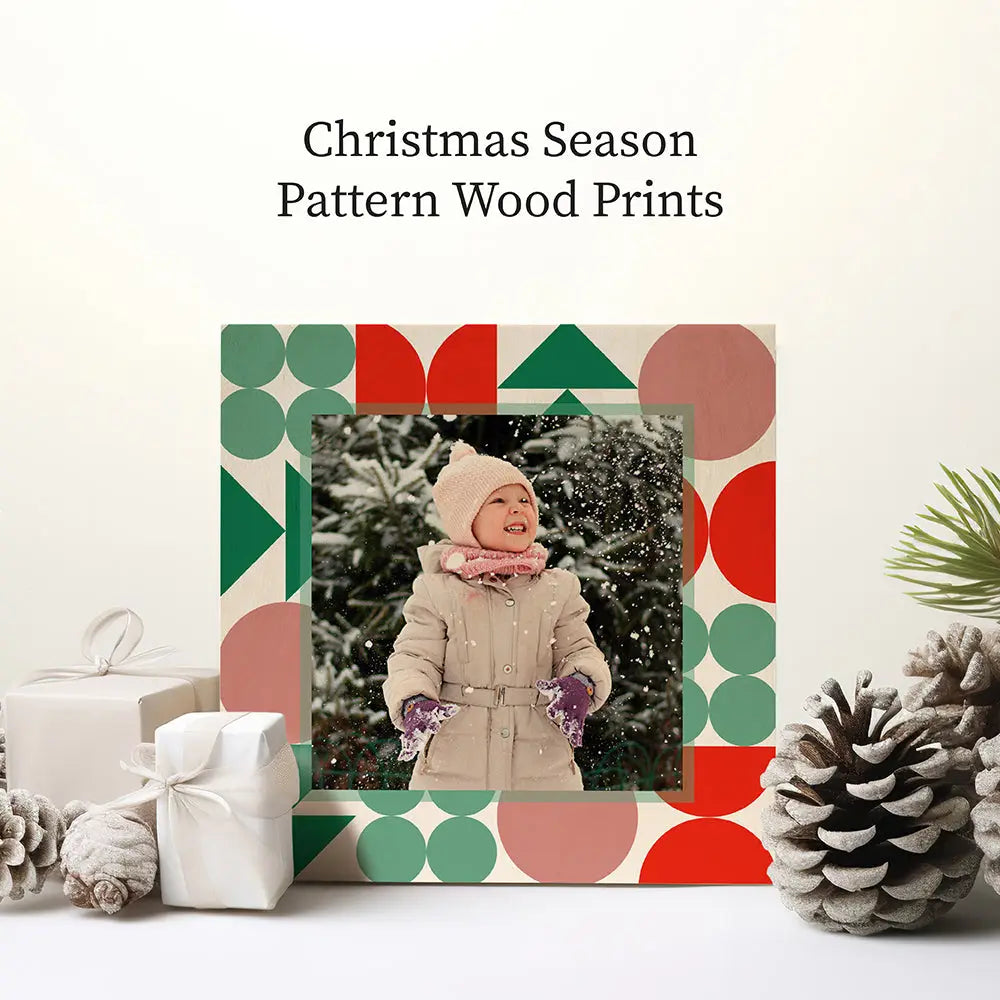 Colorful geometric birch pattern wood frame with a child in a winter scene.