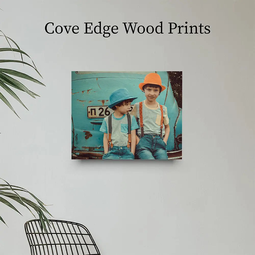 Vintage photograph of two children in hats on turquoise, Cove Edge Wood Print.