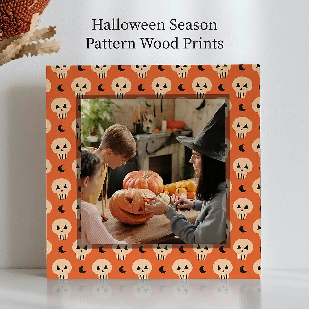 Halloween-themed frame with skull border displaying kids carving a pumpkin in birch pattern wood.