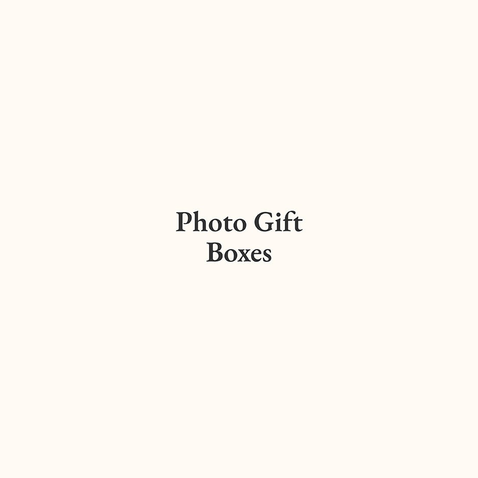 Text reading Photo Gift Boxes on a plain background showcasing Woodsnap’s wood gift.