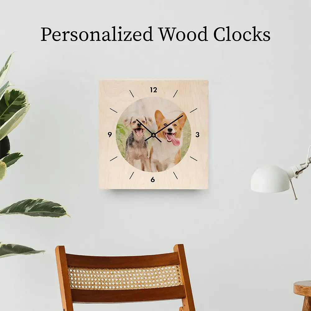 Personalized wood clock with photo of two dogs in a collection of personalized wood clocks.