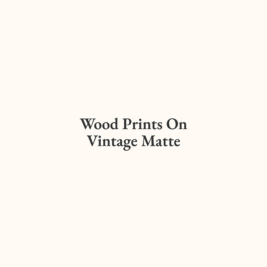 Text reading Wood Prints On Vintage Matte in serif font against a plain background.