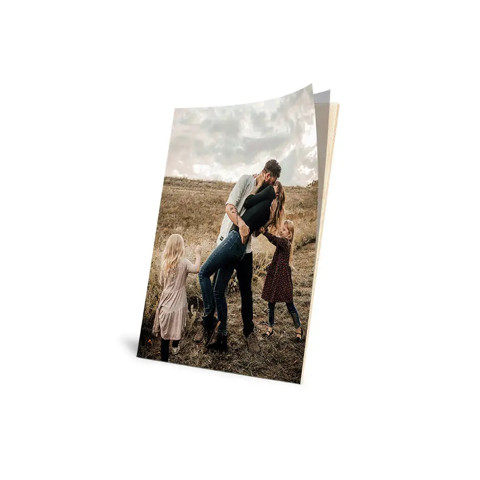 Family enjoying a sunny day in a field with a 10x14 Cove Photo Mount Print