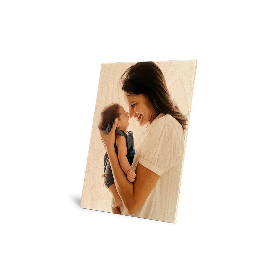 Mother holding her baby in a heartwarming moment captured in 10x14 Original Cove Print