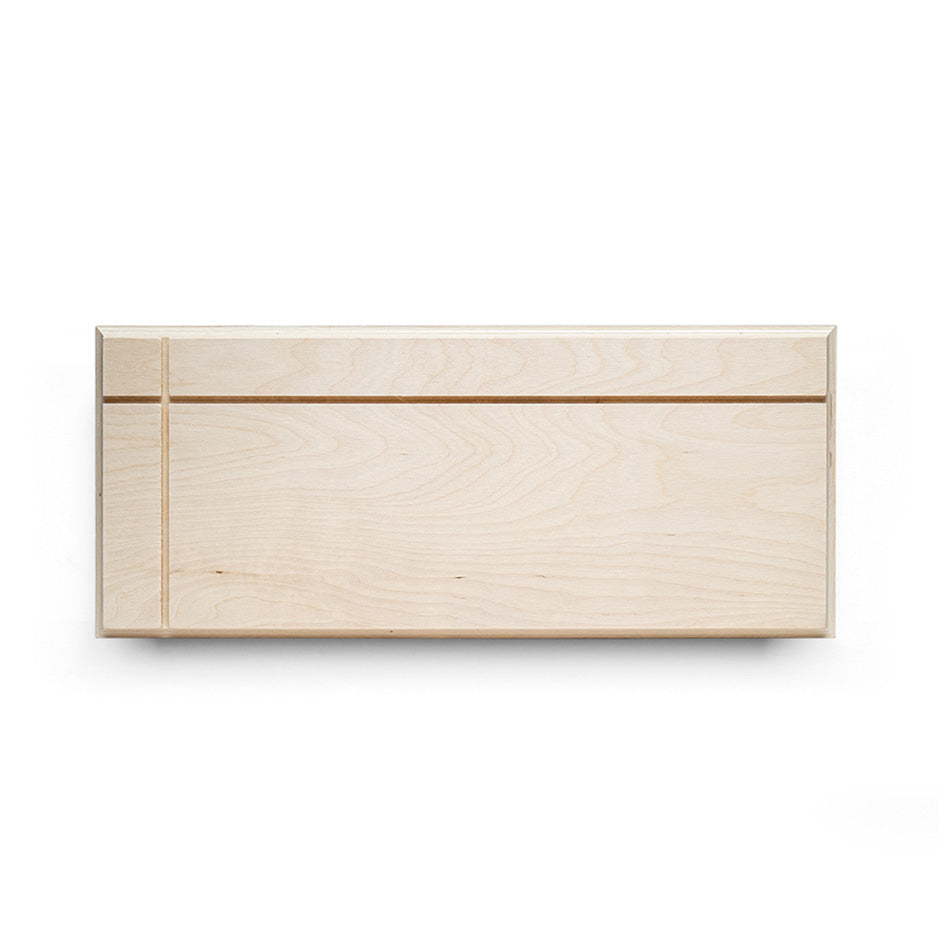 Rectangular light wood cabinet door showcasing 10x24 Original Cove Print in photo locket wood style