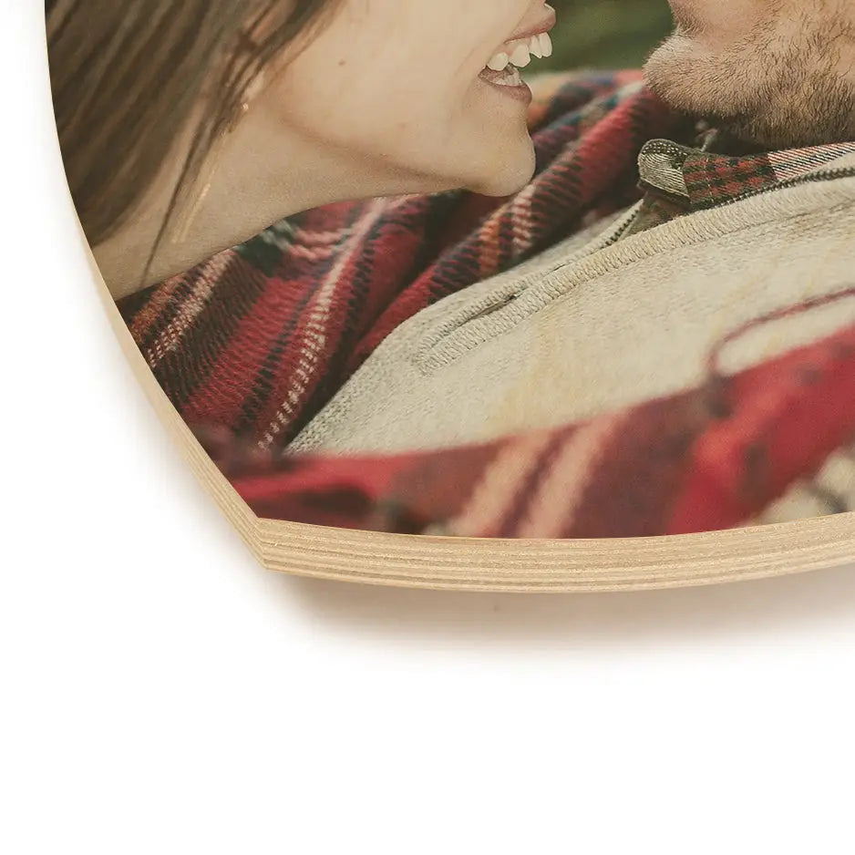 Close-up romantic moment wrapped in red plaid blanket with Heart Wood Print Vintage 12 Inch