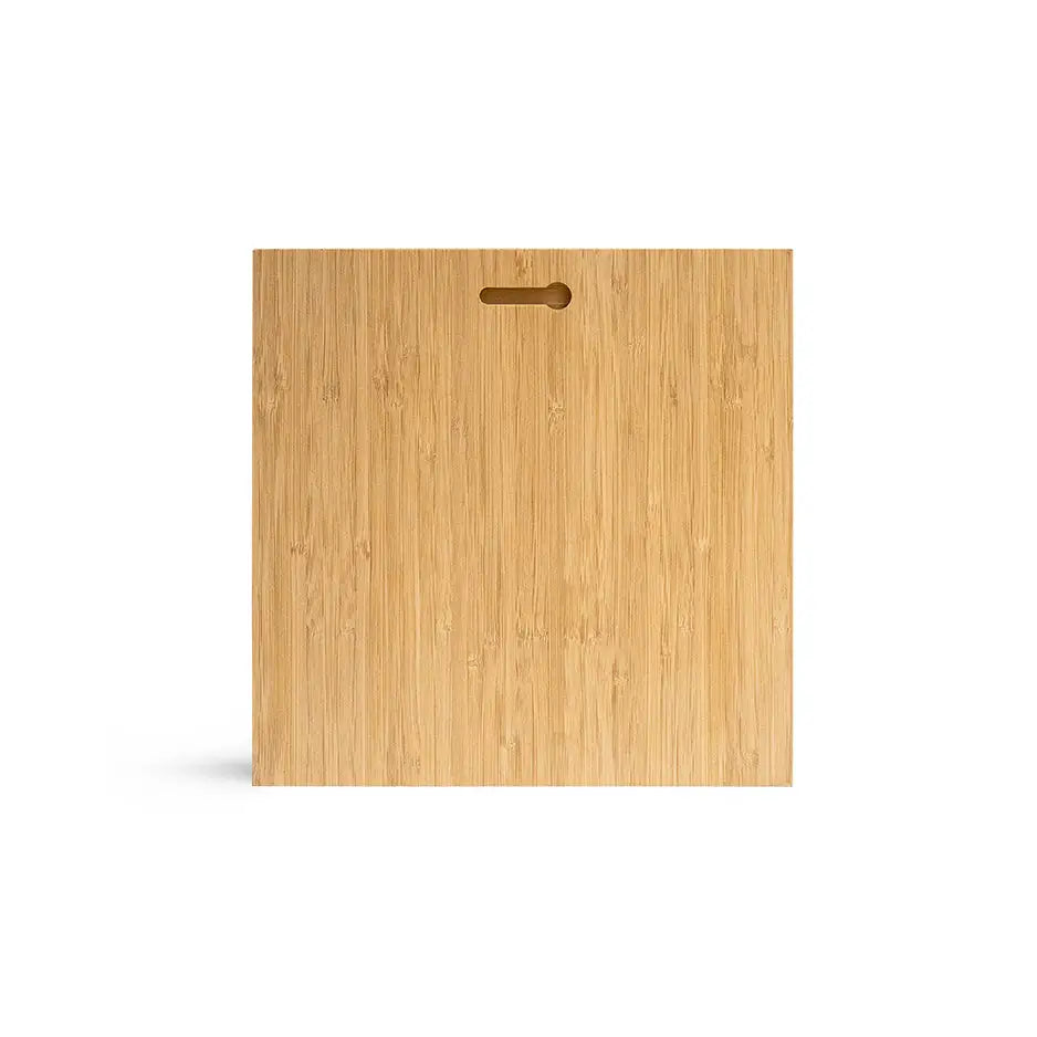 Bamboo cutting board with handle on 12x12 Bamboo Wood Print background