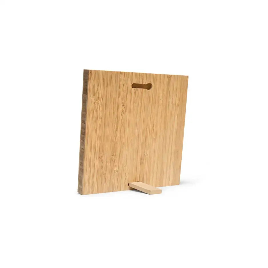 Bamboo cutting board with wooden handle from 12x12 Blank Bamboo Panel product line