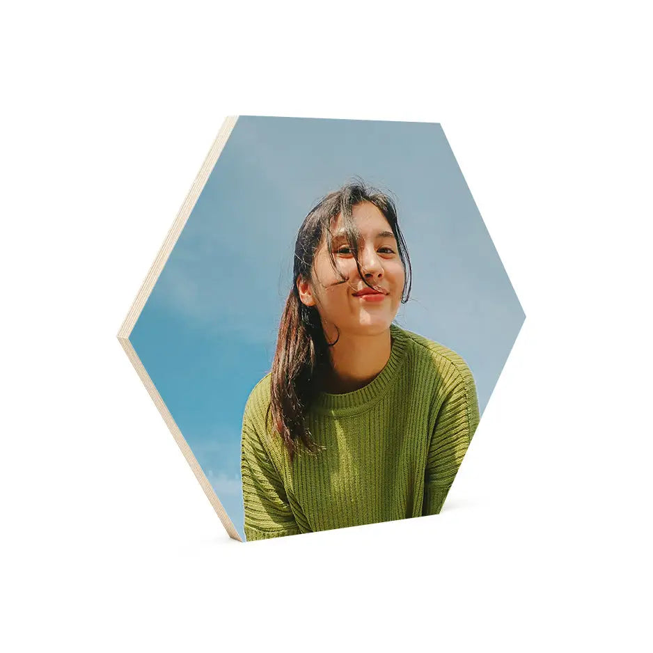 Woman in green sweater with 12x12 hexagon wood print bright white display