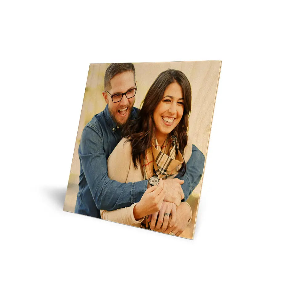 Wooden photo frame displaying a couple’s photo in 12x12 Original Cove Print style