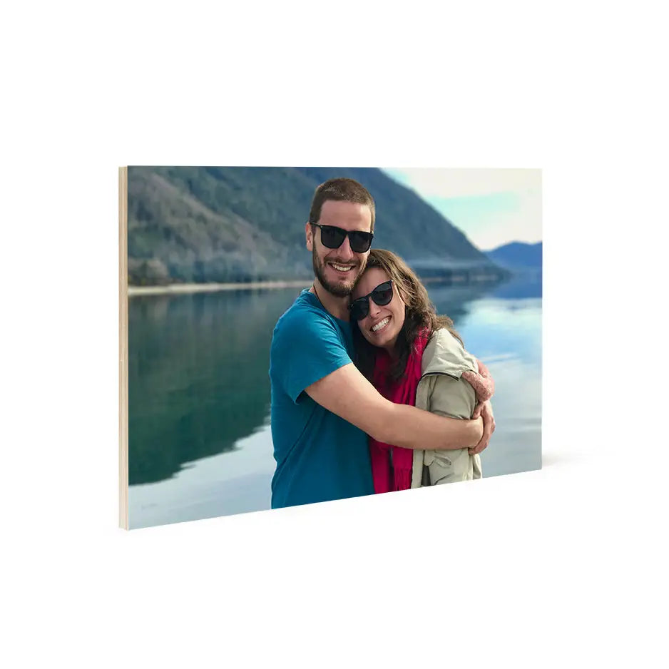 Couple hugging on lake shore in 12x18 wood print bright white image