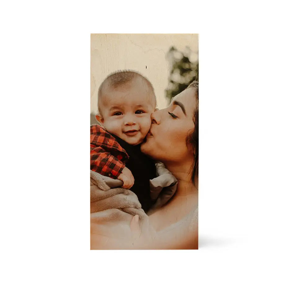 Woman holding a baby, showcasing 12x24 Wood Print Vintage design with warmth