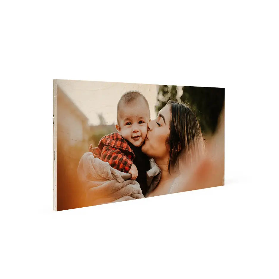 Wood Print Vintage display featuring a baby kissing in a 12x24 wood print frame