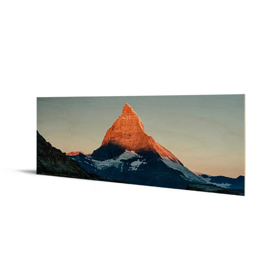 Mountain peak at sunset with pink sky, featured in 12x36 Original Cove Print