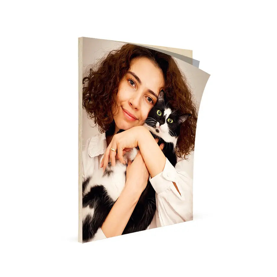 Woman holding a cat in her arms on a 16x20 Birch Photo Mount Print