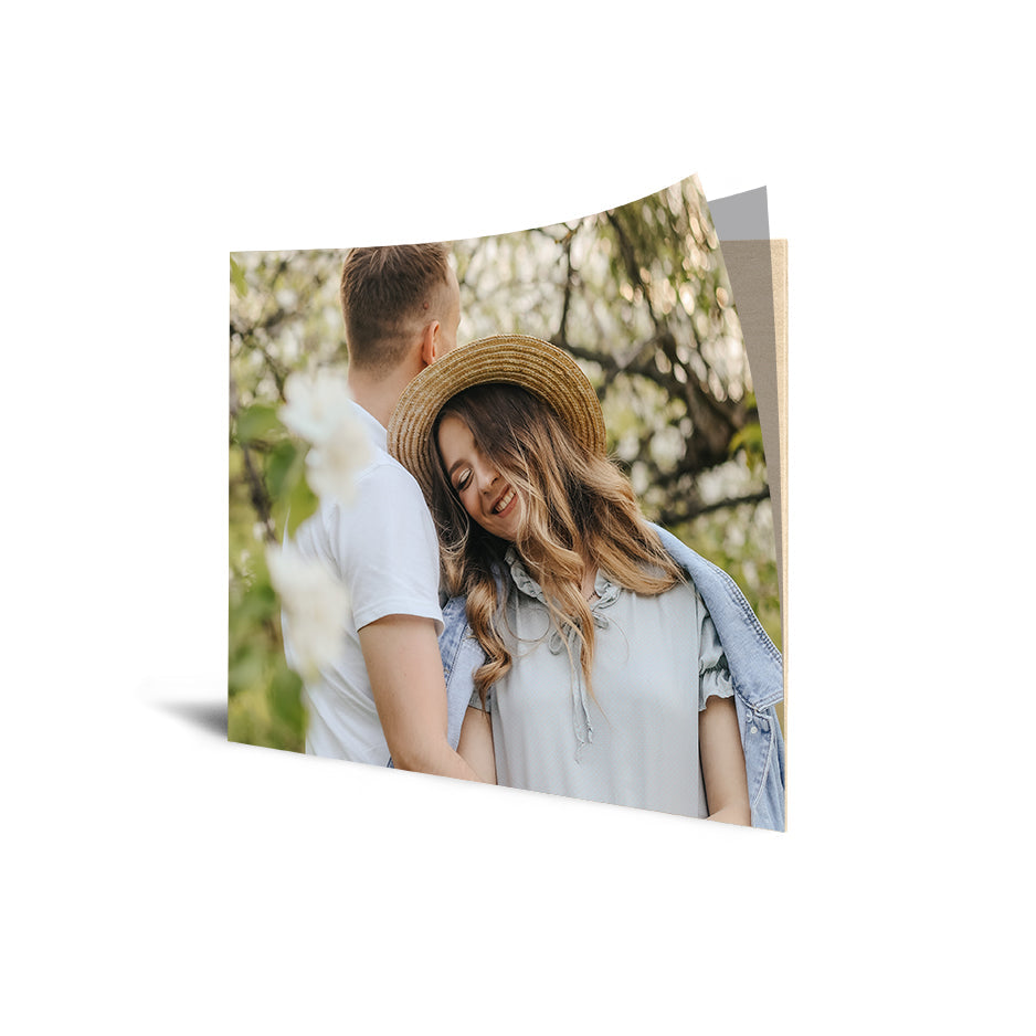 Couple on a greeting card with 16x20 Cove Photo Mount Print showcasing love