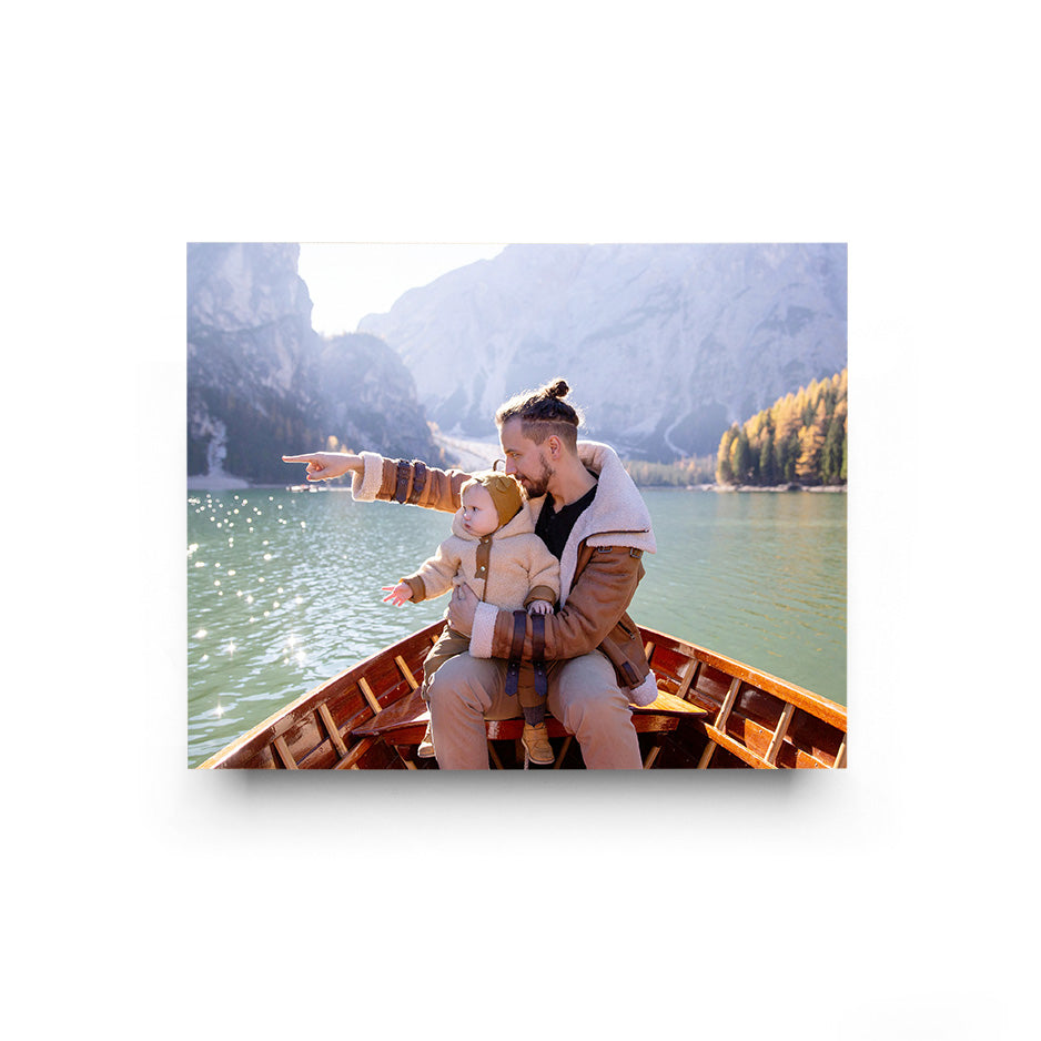 Father and child in a boat with a 16x20 Cove Photo Mount Wood Print showcasing a photo locket style
