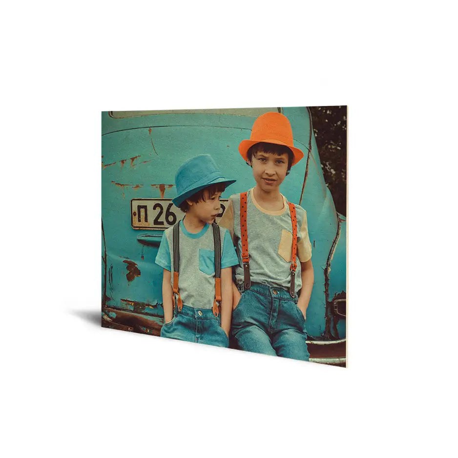 Boy in blue hat and suspenders standing by blue truck in 16x20 Original Cove Print