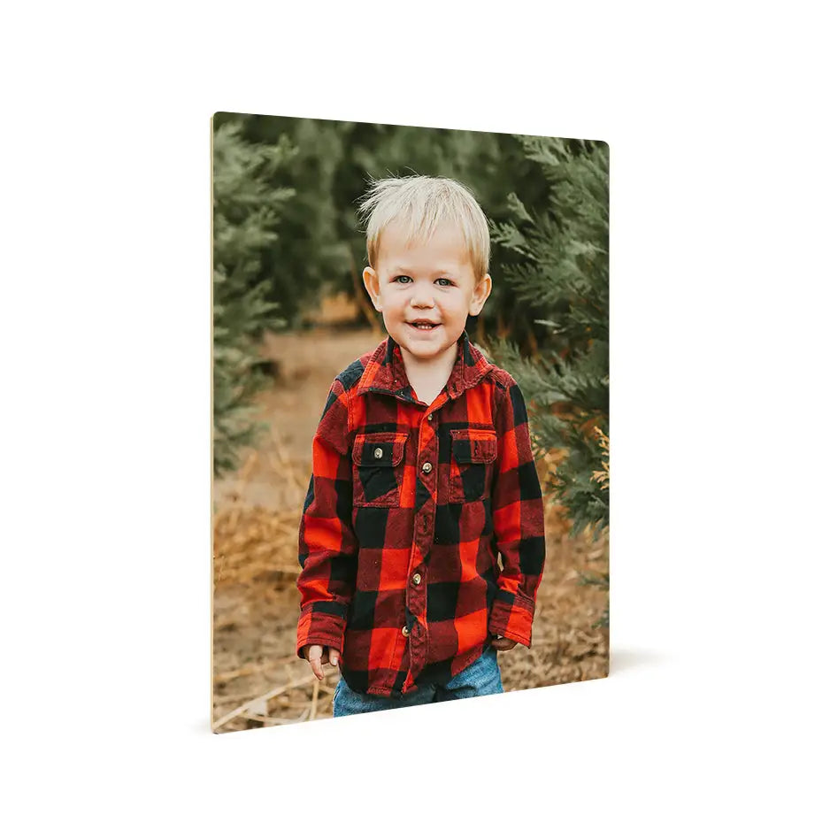 Boy in red and black plaid shirt smiles for a 16x20 photo tile display