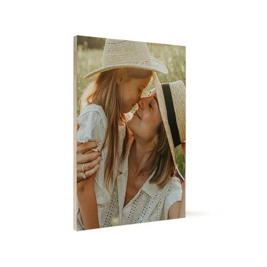 Woman kissing man on 16x20 wood print bright white for a romantic decor accent