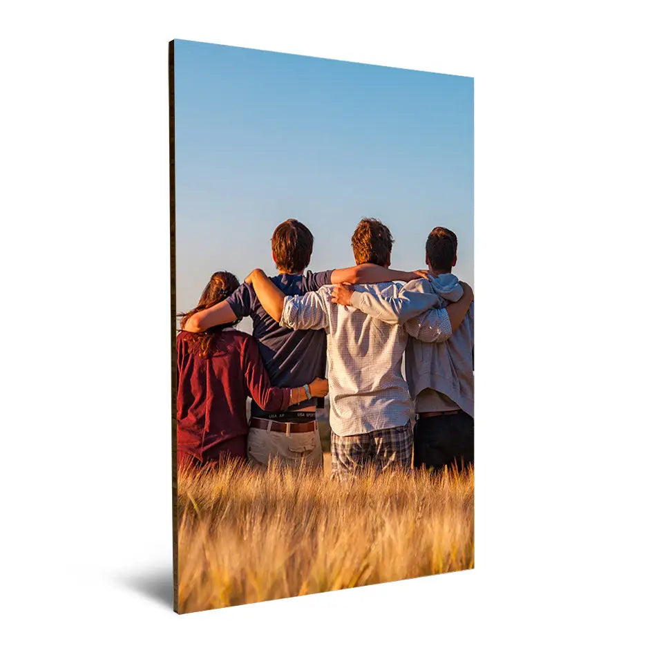 Group of people standing in a field with a 20x30 Bamboo Wood Print backdrop