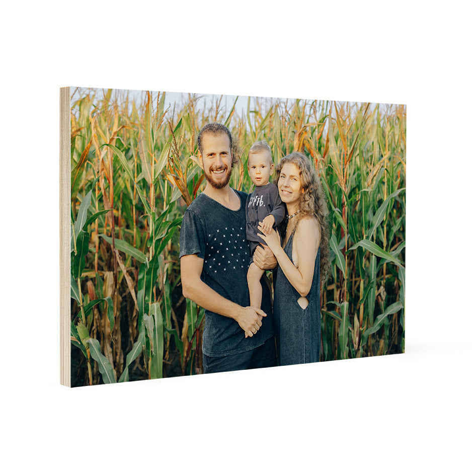 Family portrait on 20x30 bright white wood print showcasing photo locket wood design