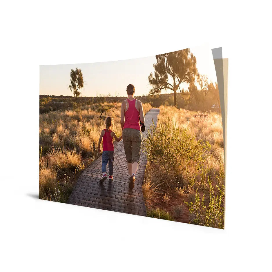 Mother and child walking down a path at sunset on a 20x30 Cove Photo Mount Print