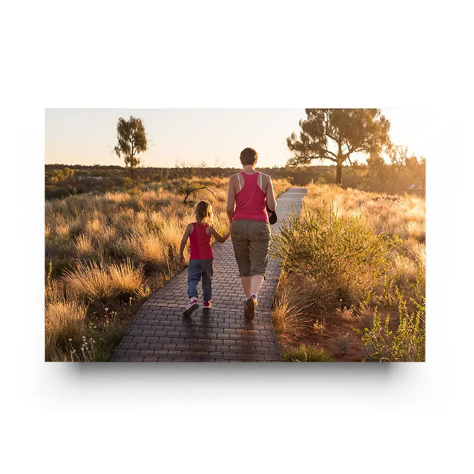 Mother and child walking on a boardwalk in the desert for a 20x30 cove photo mount