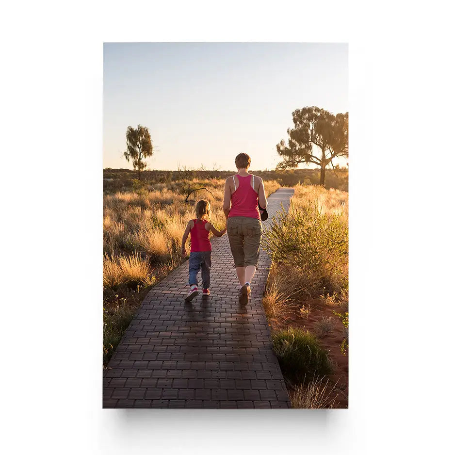 Mother and child walking in the desert on a 20x30 Cove Photo Mount Print