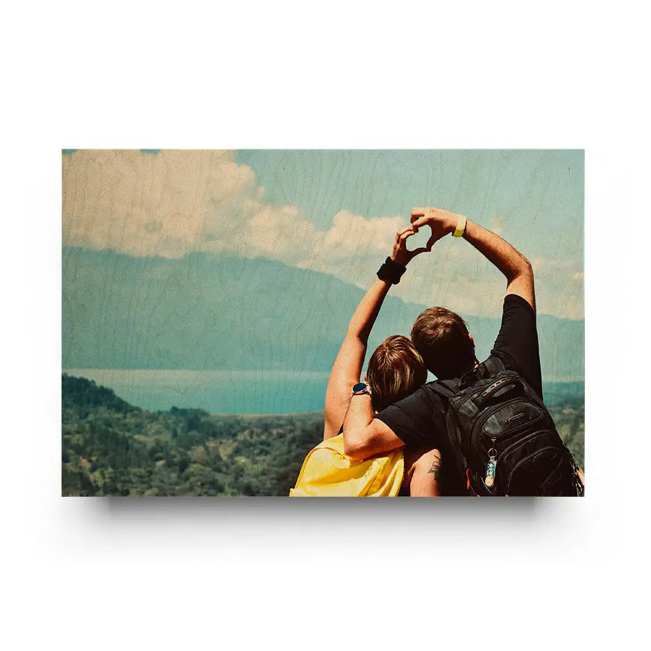 Couple taking a selfie with hill backdrop in 20x30 Original Cove Print design