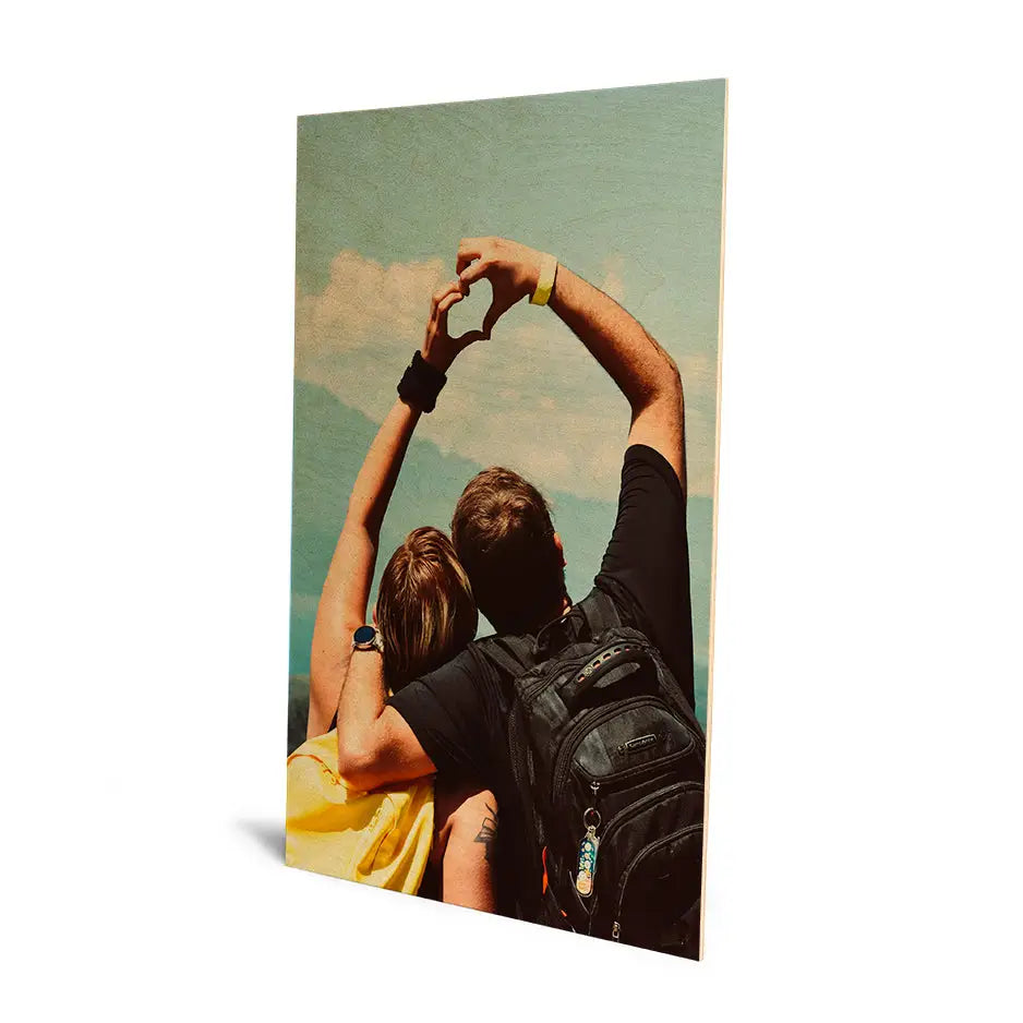 Couple holding hands in front of a sky on 20x30 Original Cove Print