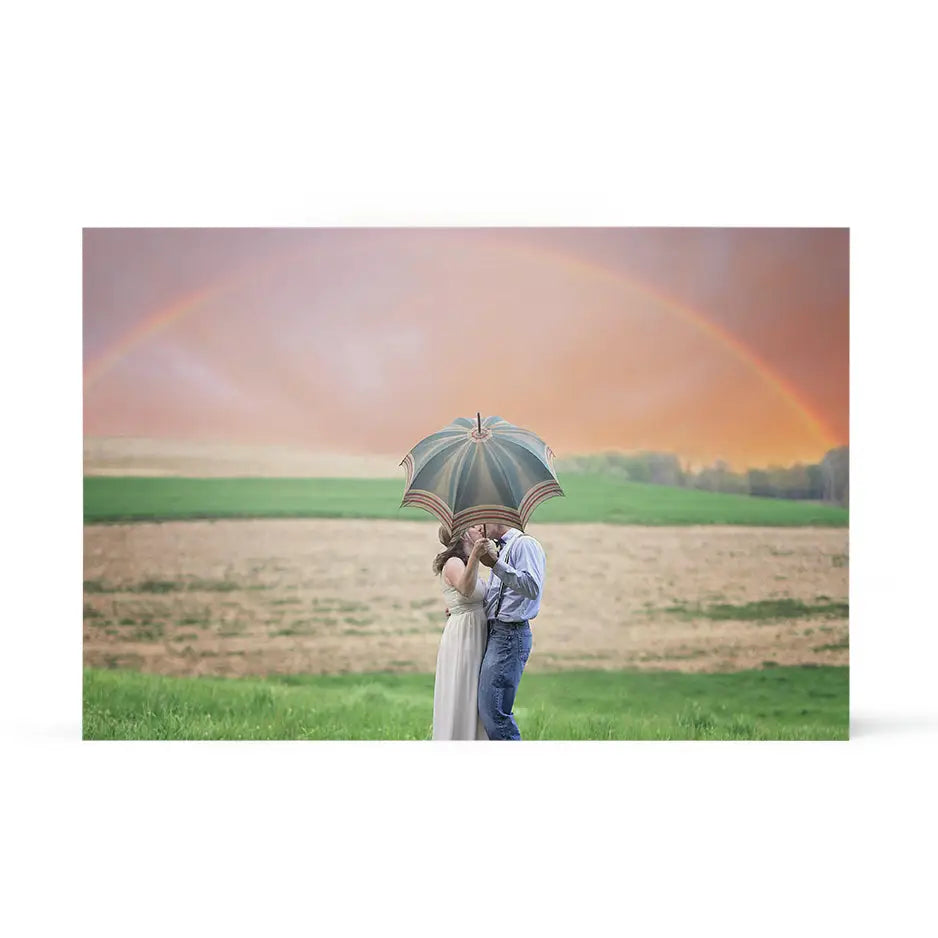 Woman holding an umbrella in a field on a 20x30 wood print display