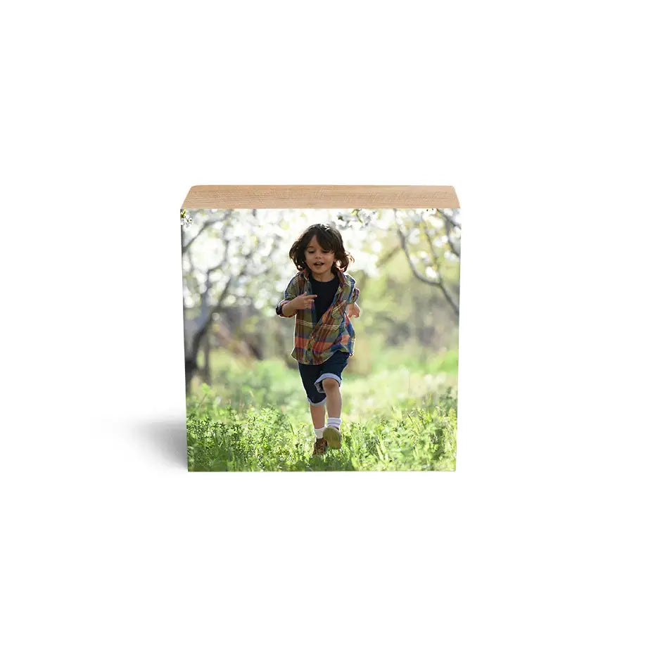 Greeting card with girl running through a field on a 4x4 Maple Photo Block