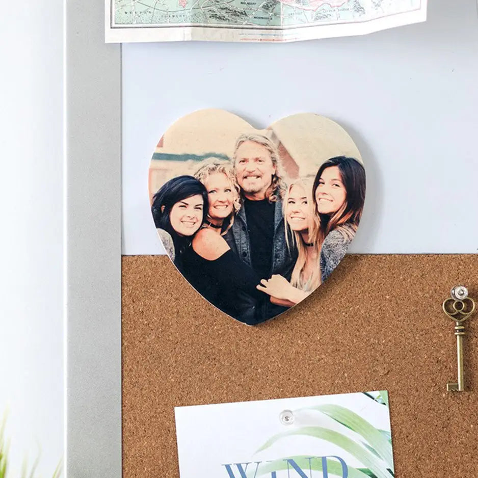 Heart Wood Print Magnet Set displayed on a cork board with a heart-shaped photo