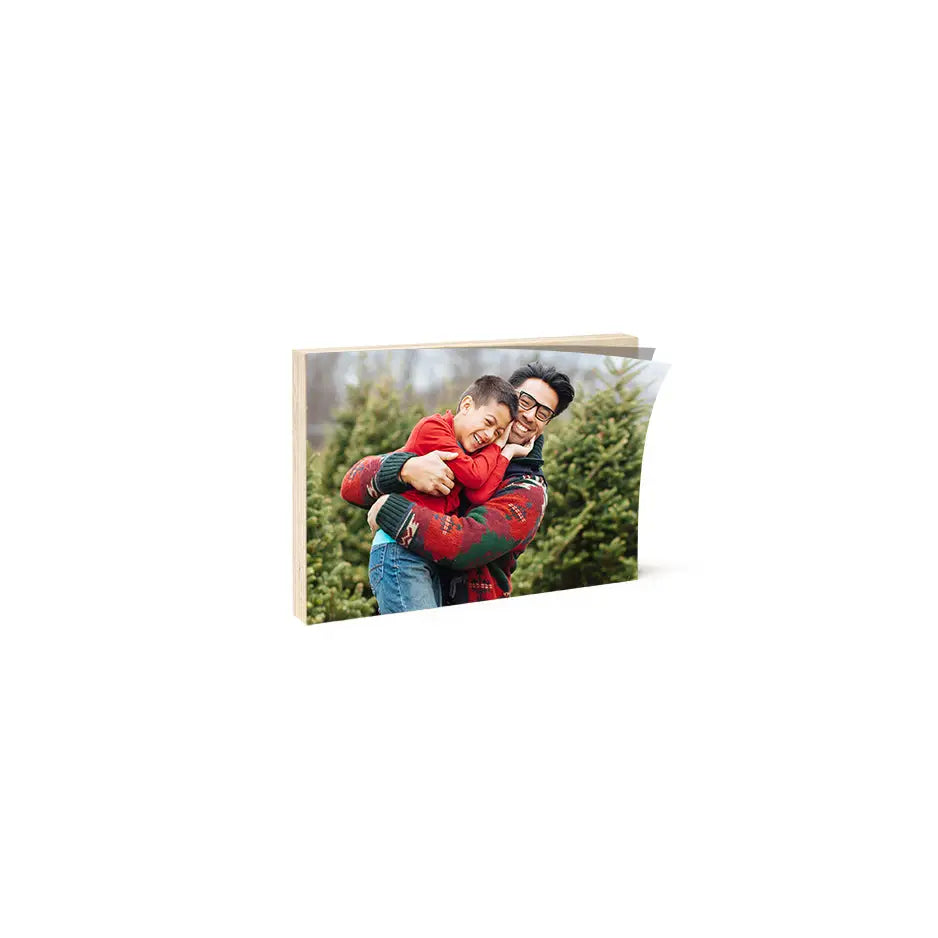Christmas card featuring a father and son on a 5x7 birch photo mount print