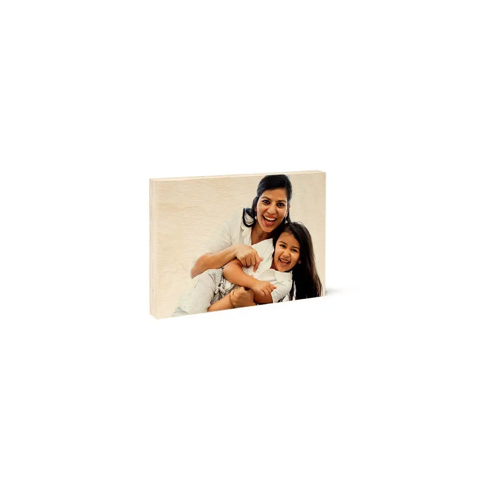 Woman holding a baby in her arms on a 5x7 wood print vintage style