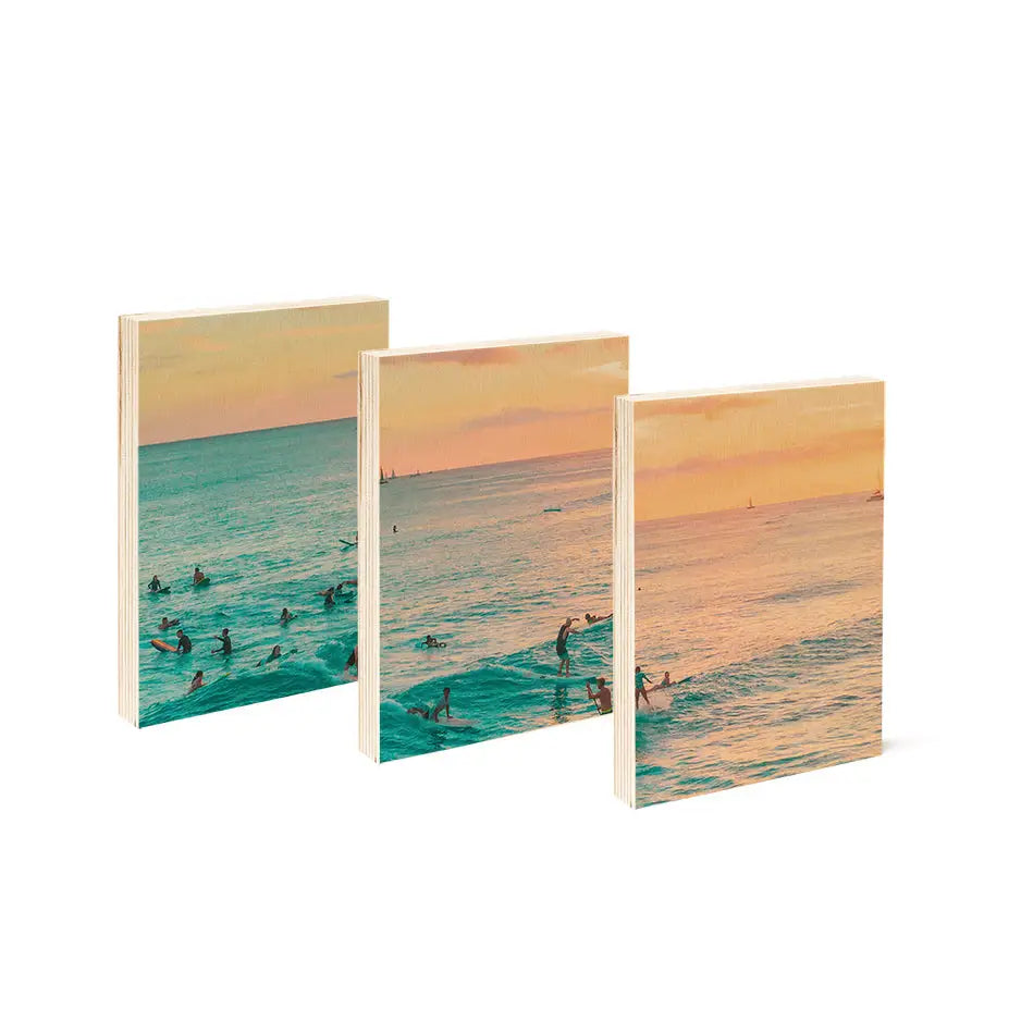 Three canvases of surfers at sunset in a 5x7 multi panel print collection