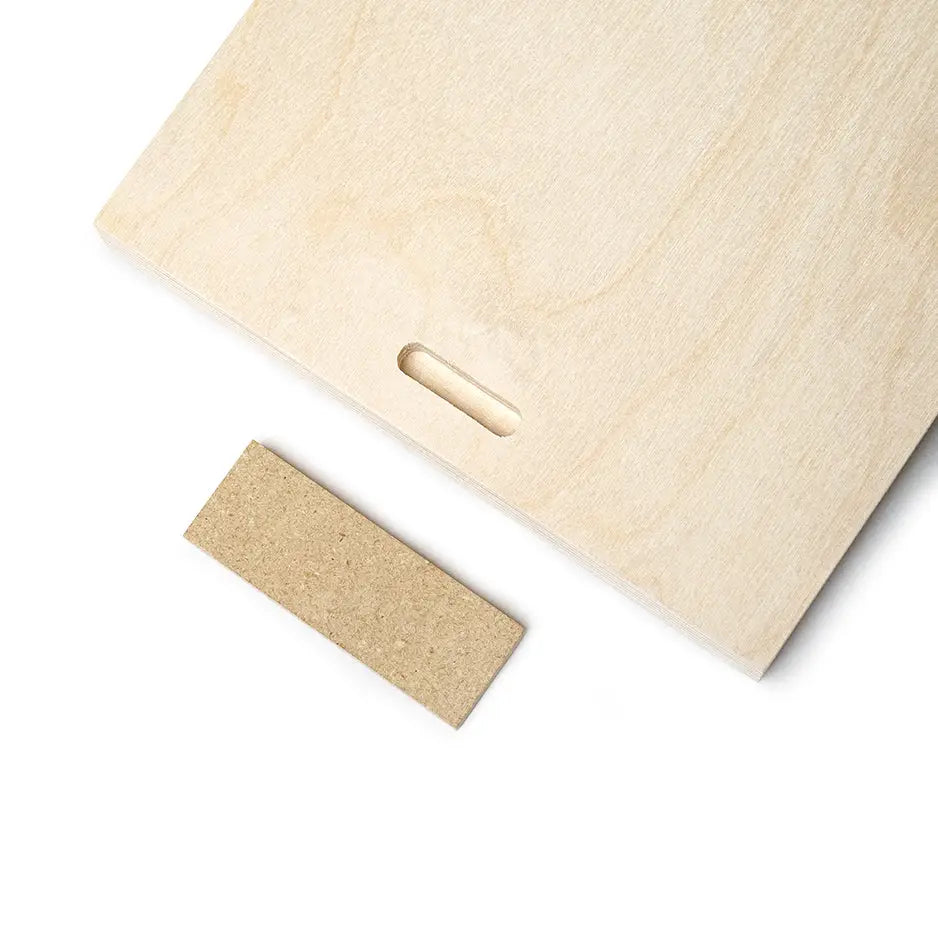 Wooden cutting board with a 6x6 Birch Photo Mount Print featuring a piece of wood