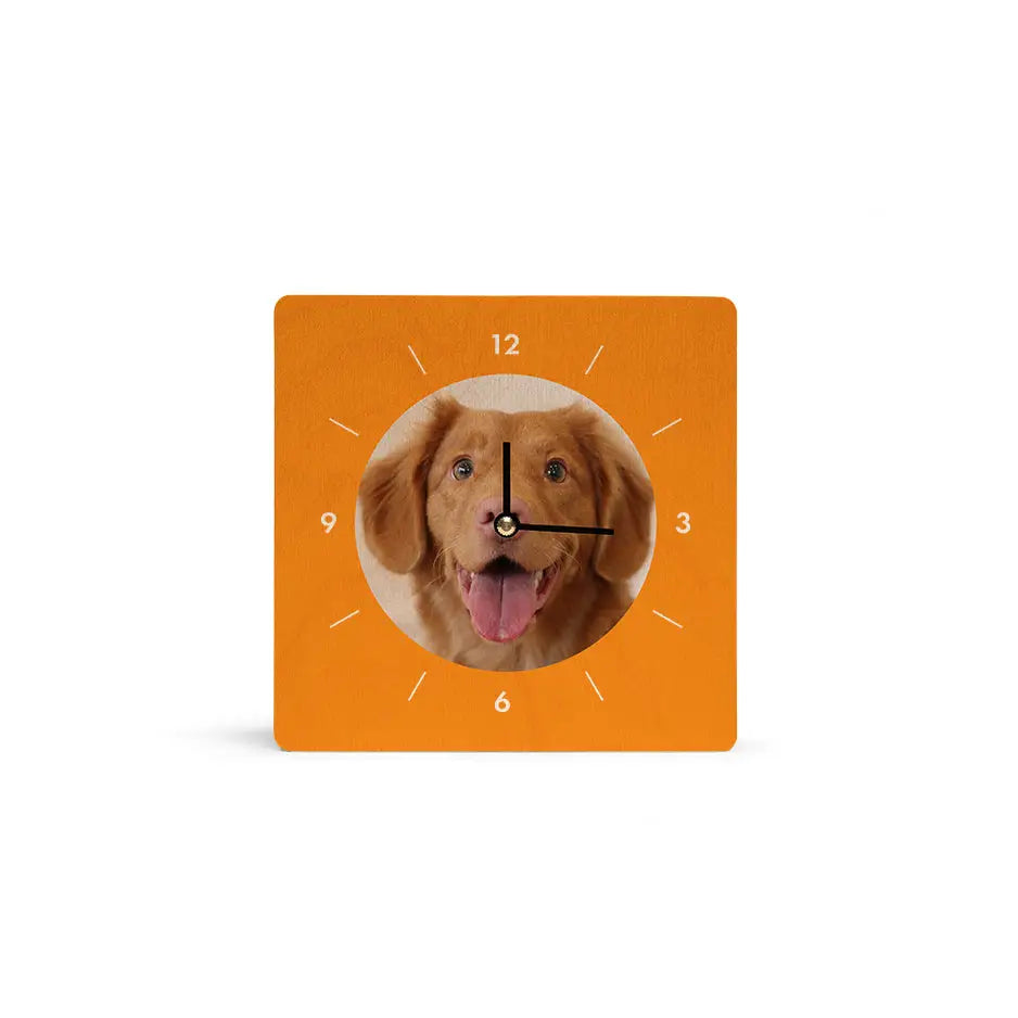 A 6x6 Circle Personalized Clock featuring a playful dog’s face design