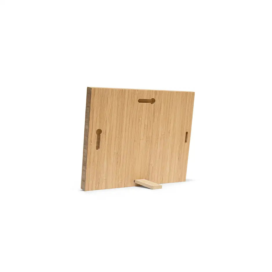 Wooden cutting board with a hole, featured in an 8x10 Bamboo Wood Print design