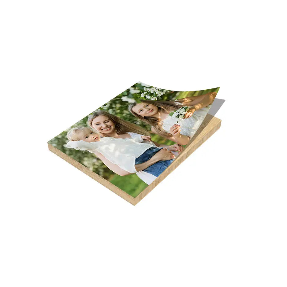 Two girls enjoying a sunny day in a field of flowers on an 8x10 bamboo wood print