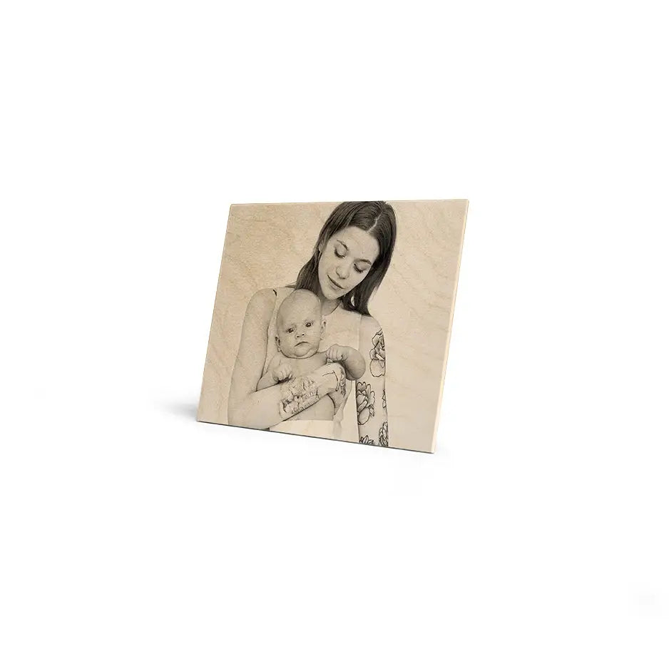Woman holding a baby in a wooden photo frame of 8x10 Original Cove Print