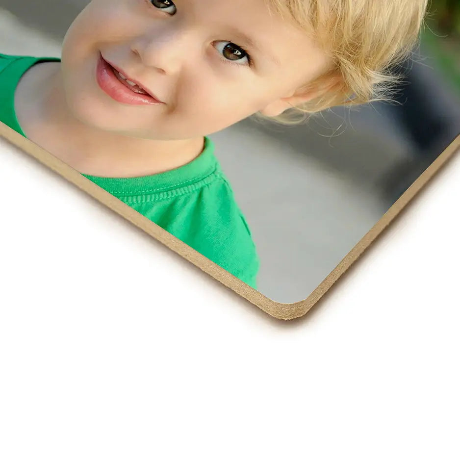 Young boy smiling at the camera on an 8x10 photo tile perfect for keepsakes