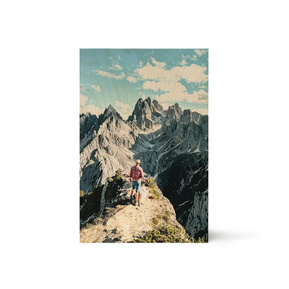 Man sitting atop a mountain featured on an 8x12 wood print vintage design