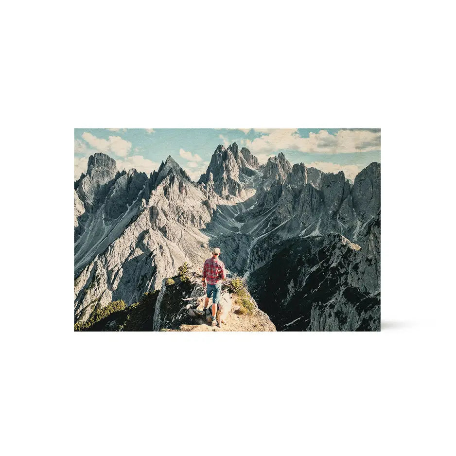 Man sitting on a mountain in an 8x12 wood print vintage for timeless decor