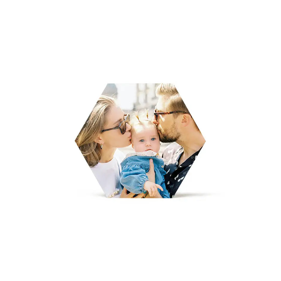 Woman holding a baby in her arms displayed on an 8x8 hexagon birch photo mount