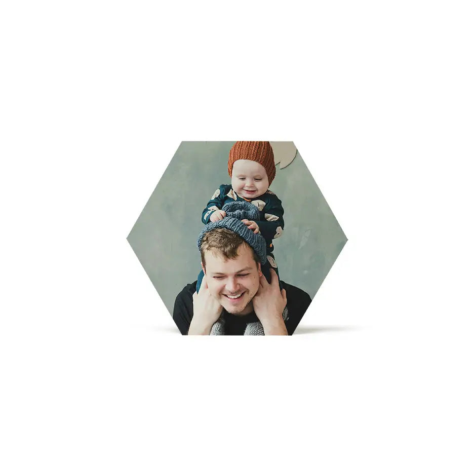 Man holding a baby in arms on 8x8 hexagon wood print for cherished memories