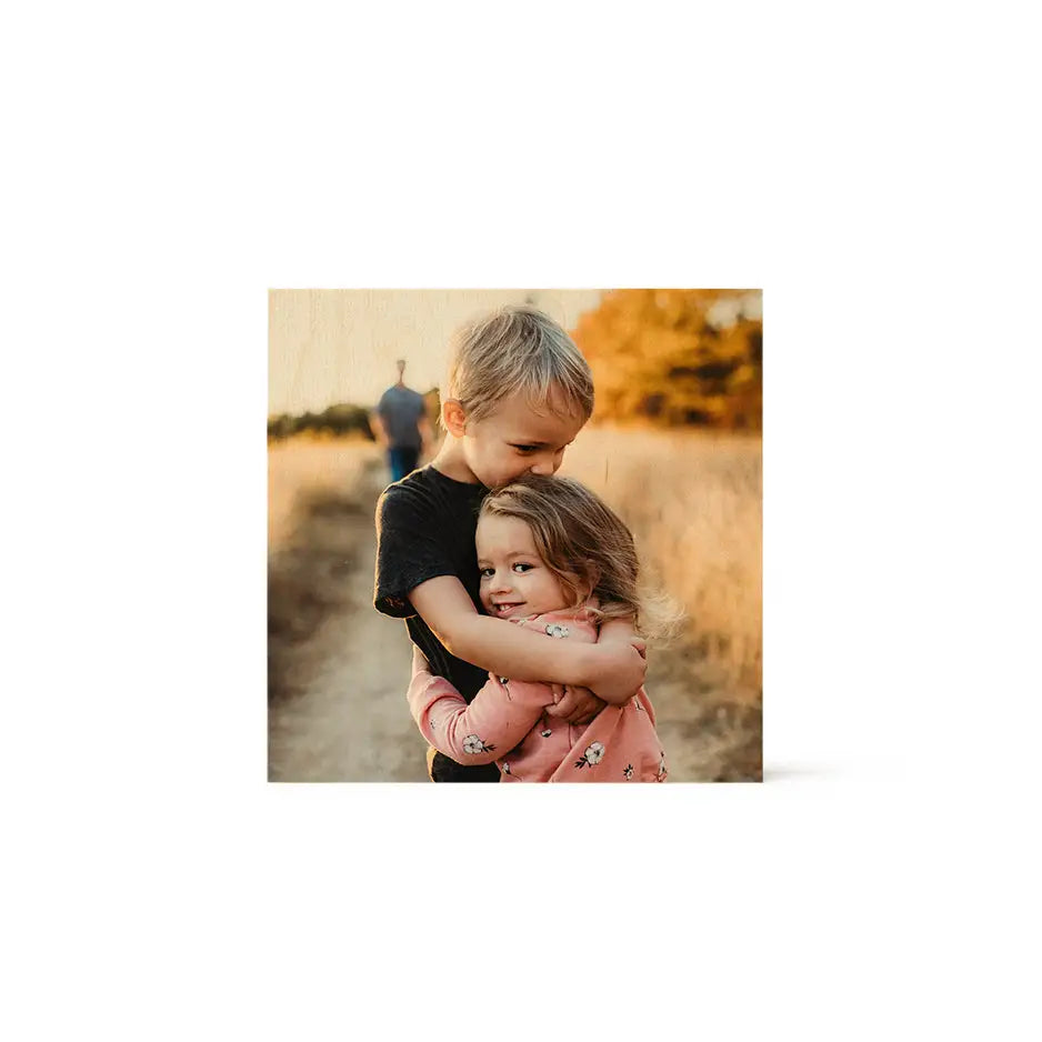 Little girl hugging her brother on an 8x8 Wood Print Vintage display