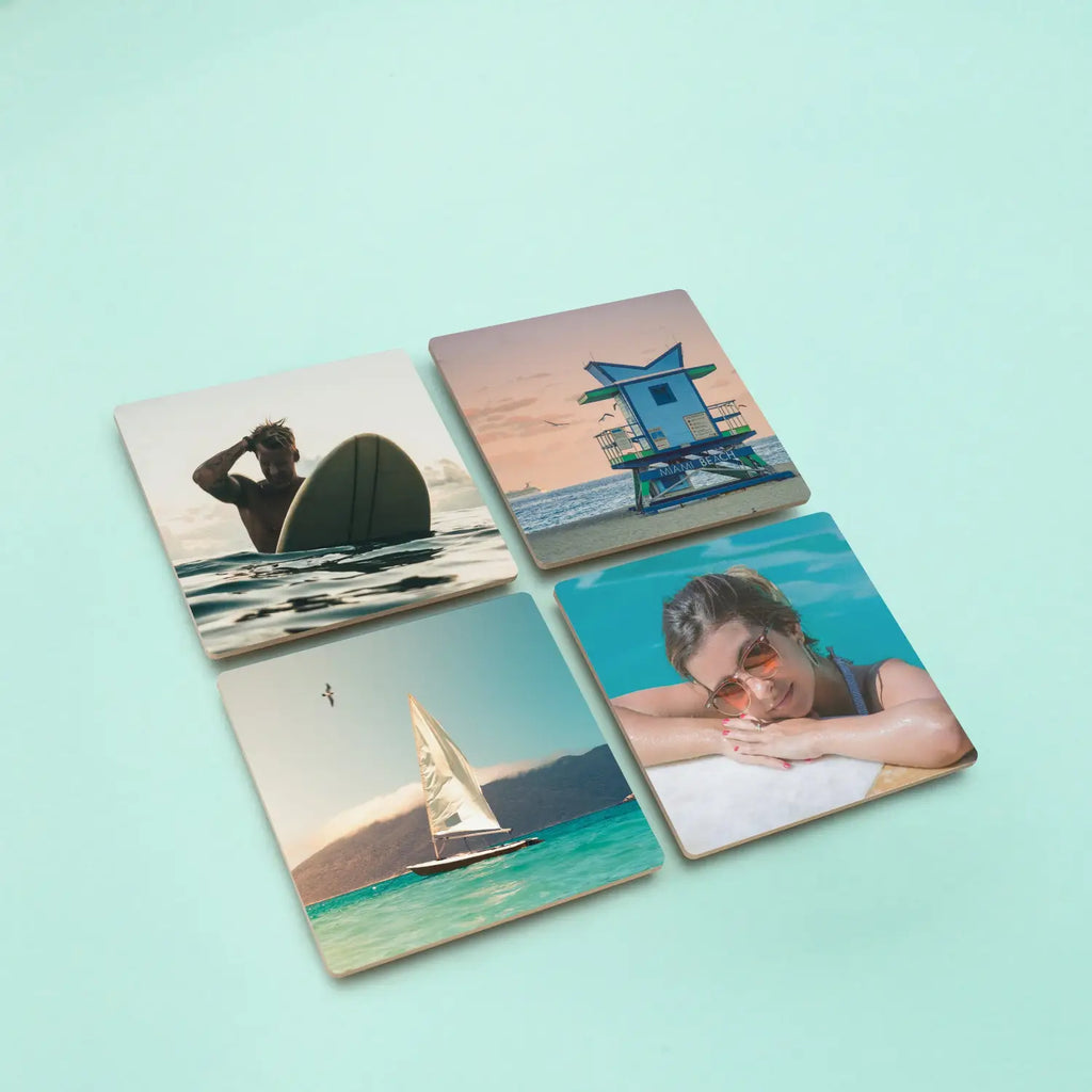 Gallery wall display with multiple MDF photo tiles showing family and travel photos
